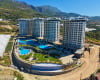 Alanya Mahmutlar’da Dört Bloklu Sitede Kale Manzaralı Daireler 1