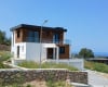 Kuzey Kıbrıs Girne'de Site İçi Özel Havuzlu Tripleks Villalar 1