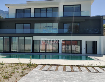 Fethiye Ölüdeniz'de Doğanın Kalbinde Modern Zarif Lüks Villa 4