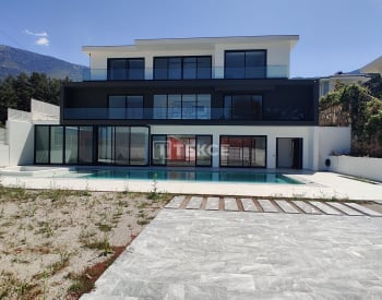 Fethiye Ölüdeniz'de Doğanın Kalbinde Modern Zarif Lüks Villa 3