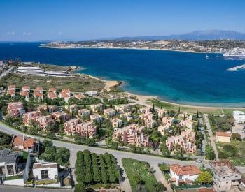 İzmir Çeşme'de Deniz Manzaralı Plaja Sıfır Site İçinde Daireler 1