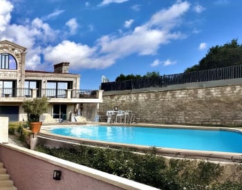 Specially Designed Stone-coated Home with Pool in Çeşme 1