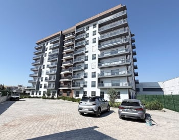 Apartamentos Con Vistas A La Ciudad En Un Edificio Nuevo En Çiğli