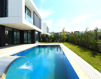 منازل ذات تصميم أنيق مع حمامات سباحة خاصة في بورصة نيلوفر 1