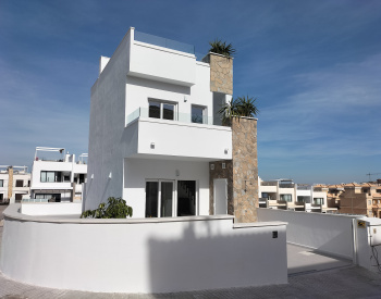 Elegant Townhouses with Pools in Villamartin Costa Blanca 1