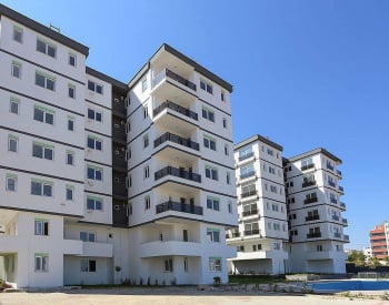 Новые квартиры с балконом и отдельной кухней в Анталии 1
