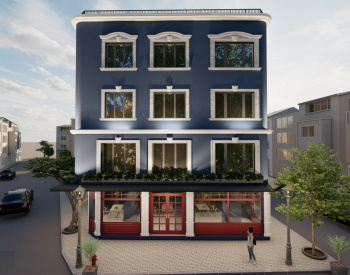 位于法提赫的一楼设有咖啡馆和公寓的大楼