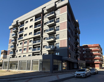 آپارتمان‌ها در ساختمانی با پارکینگ سرپوشیده در کارشیاکا ازمیر 1