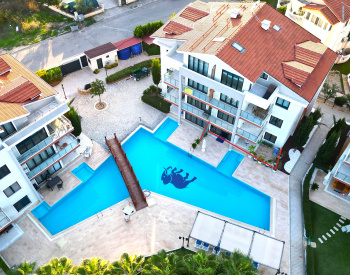 آپارتمان باغچه‌ای مبله ۲خوابه در مجموعه‌ای با استخر در بلک 1