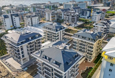 شقق بإطلالة في مشروع 350 م من البحر في كارجيجاك، ألانيا 1