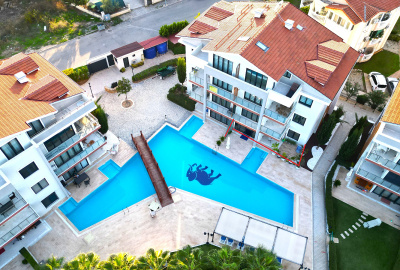 آپارتمان باغچهای مبله ۲خوابه در مجموعهای با استخر در بلک 1