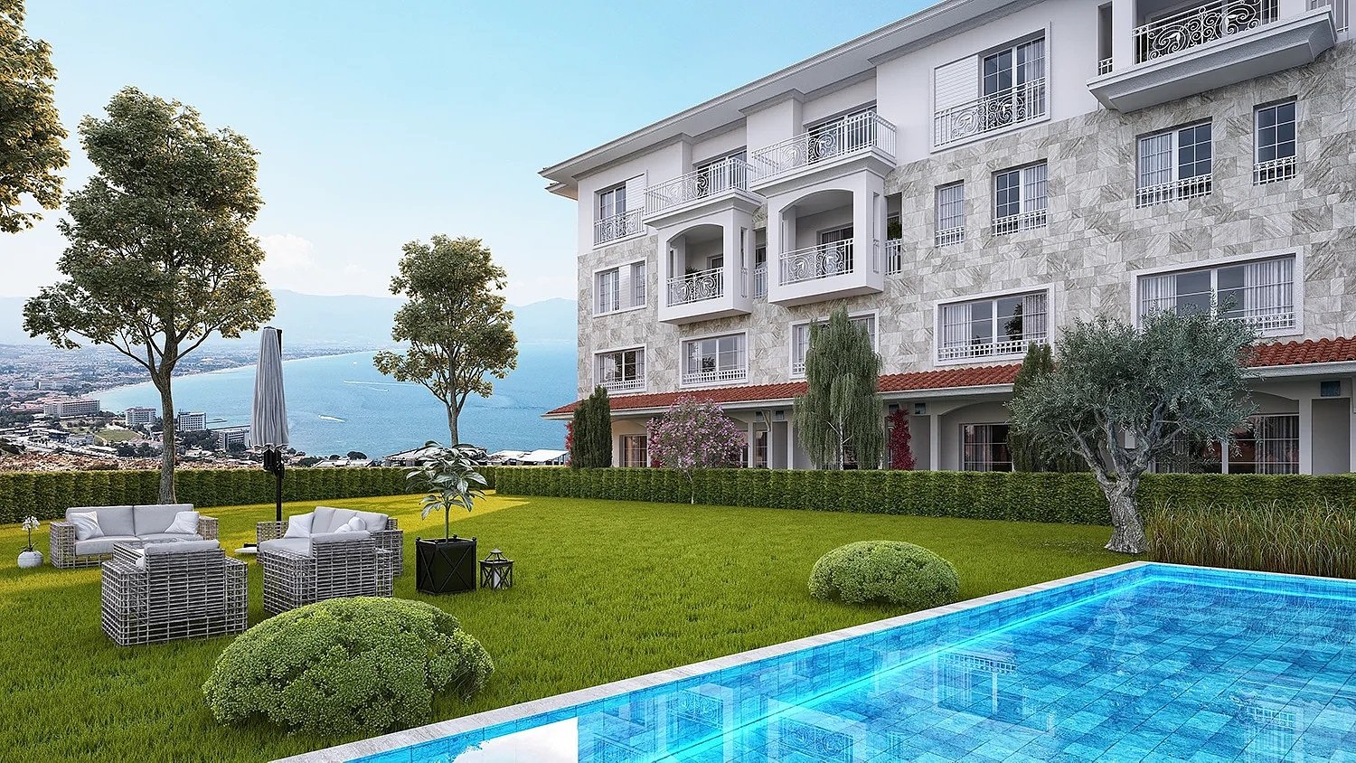 Kuşadası'nda Deniz Manzaralı ve Havuzlu Site İçinde Daireler
