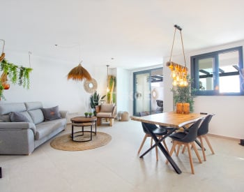 View of A Stylish Penthouse Apartment with Exposed Beams