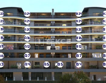 Kuşadası'nda Havuzlu ve Deniz Manzaralı Sitede Daireler 57