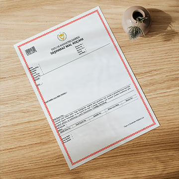 a legal documents on table with small pot