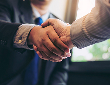 two person handshaking  two person handshaking