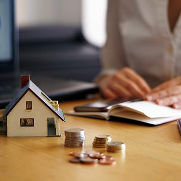 Small house figurine with euro currency, illustrating Turkey’s rental tax obligations, exemptions, and tax differences for rental properties Small house figurine with euro currency, illustrating Turkey’s rental tax obligations, exemptions, and tax differences for rental properties